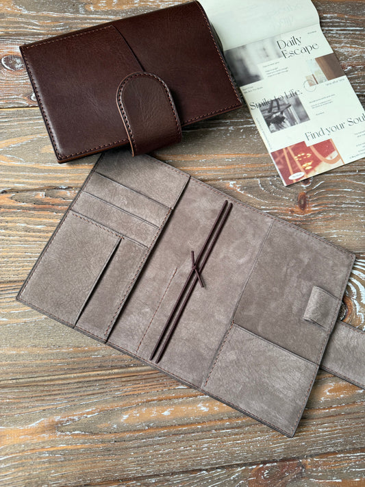 Sterling Ink cover with Nubuck interrior leather with snap closure